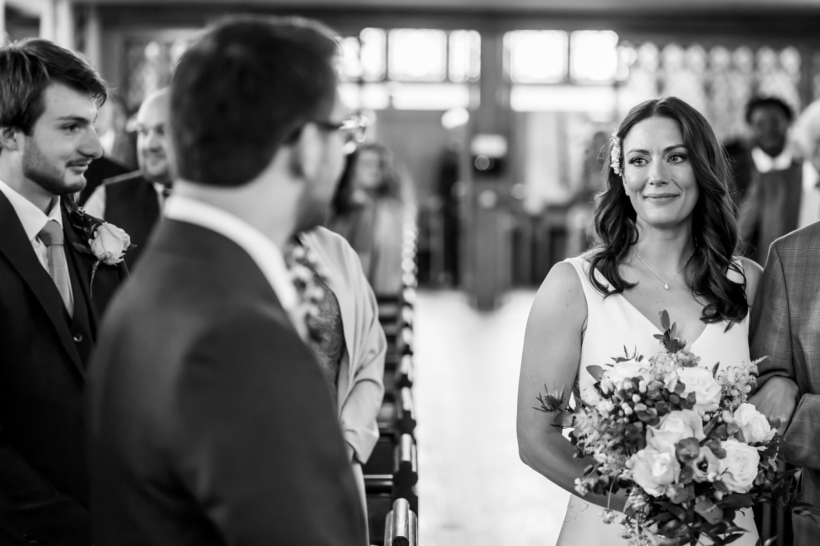 A teary moment as the bride walks towards her husband-to-be