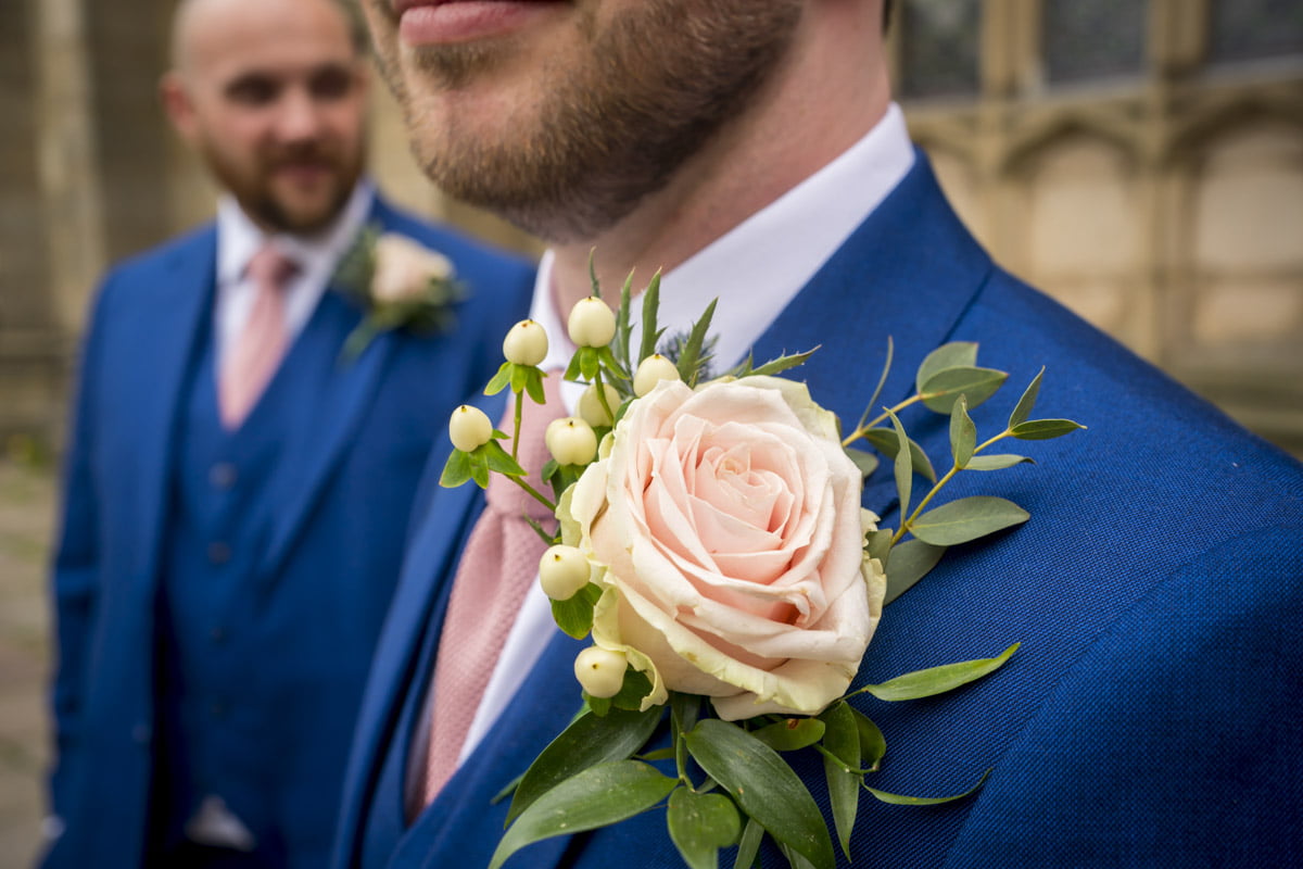 The groomsmen's buttonhole outside St Mary’s RC Church