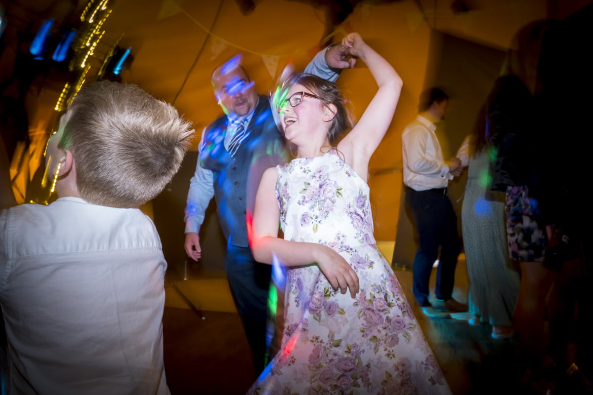 The guests dance tipi wedding photography
