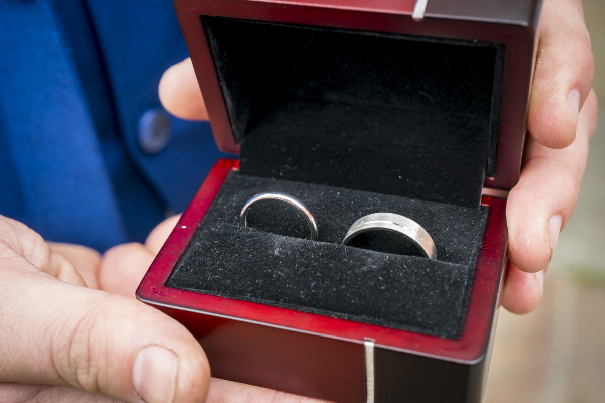 A close up shot of the wedding rings
