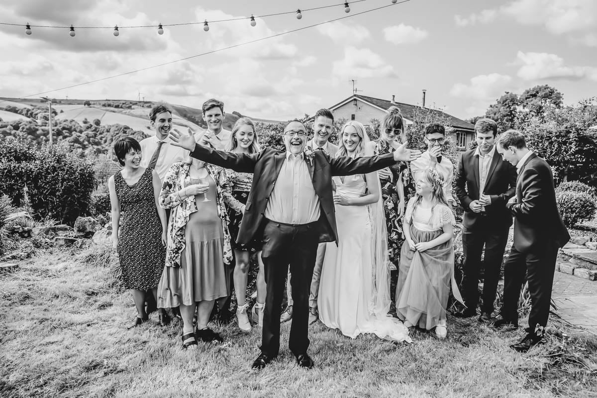 Everyone gathers for group wedding photography